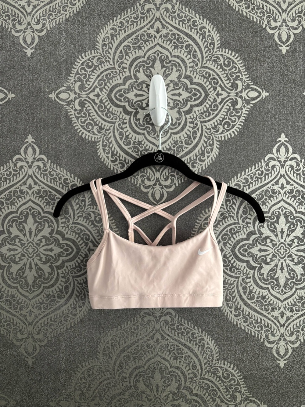 Nike pale pink strappy sports bra with crisscross back